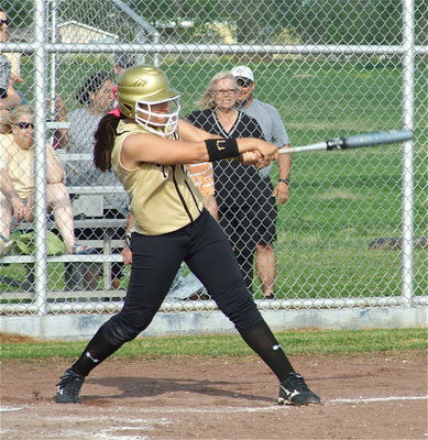 Image: Strong at bat — Alyssa Richards(24) gets all of that one.