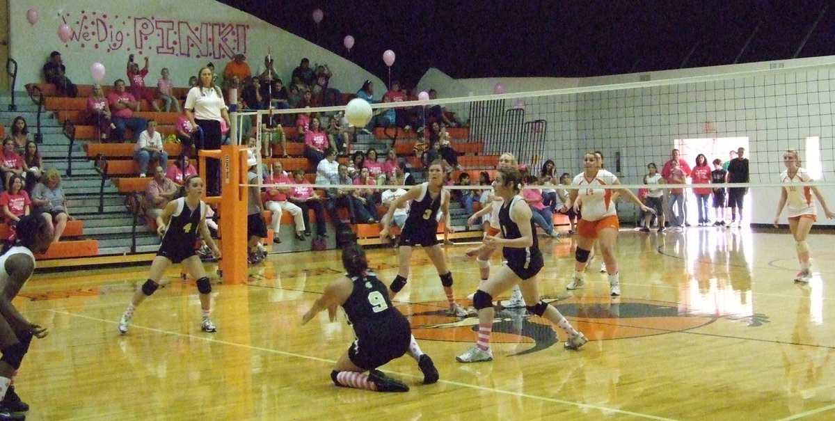 Image: Set it up — Cori Jeffords gets under the ball for the set up.