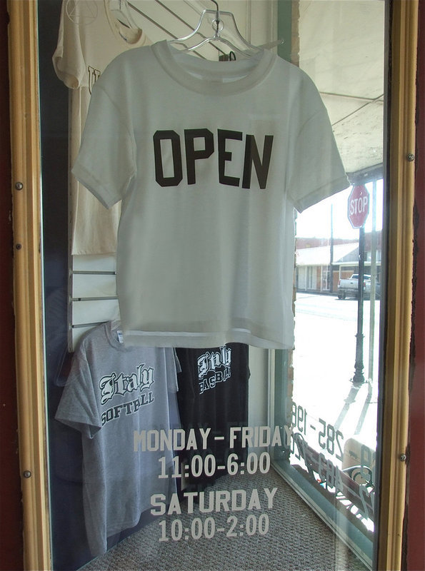 Image: Open for business — Game On Athletics is open Monday thru Friday, 11:00 a.m. to 6:00 p.m. and Saturday 10:00 a.m. to 2:00 p.m. You can also tell when Game On Athletics is opened or closed by their creative Open/Closed shirt sign hanging on the front door.