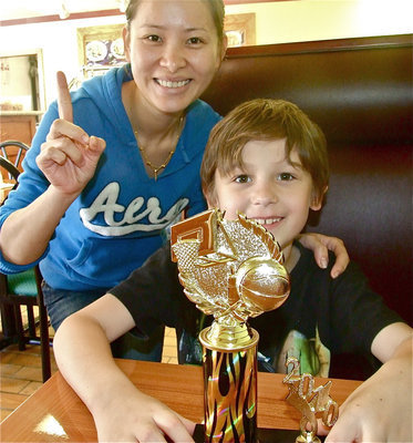Image: Xander had a great day — Xander Galvan had a great day after his family surprised him by taking him to Game On Athletics to receive his IYAA Basketball trophy and then with Chinese food at Keng Wok across the street where Ling helped him celebrate.