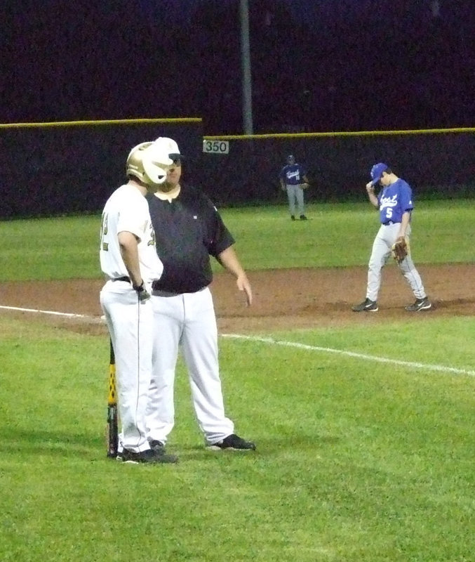 Image: Ashcraft consults — While Frost meets at the mound, catcher Ryan Ashcraft visits with Coach Coker about the next play.