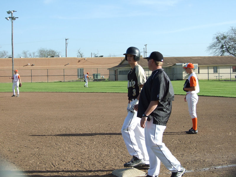 Image: Jase Holden — Jase and Coach Ward take care of business at first base.