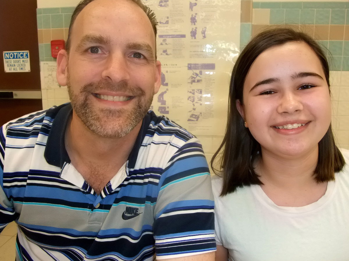 Image: Doug Nelson &amp; Amber Hooker — Doug Nelson was the bingo caller and Amber Hooker was keeping track of the winning bingos.