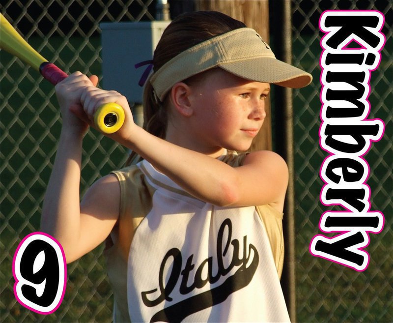 Image: Kimberly concentrates — Kimberly Hooker gets in a few swings before taking the field.