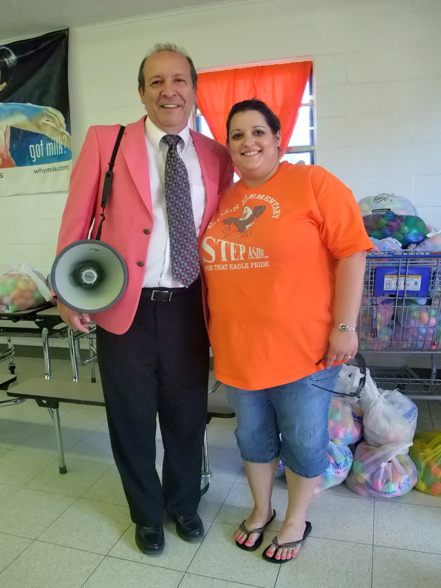 Image: David DelBosque and Melissa Gill — David DelBosque (superintendent) says, “Melissa organized this whole egg hunt and hotdog dinner.”