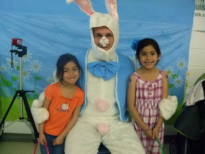 Image: Cassandra, Melanie and the Easter Bunny — Cassandra Hernandez, the Easter Bunny and Melanie Hernandez having fun getting their picture taken.