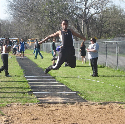Image: Heath Clemons — Clemons leaps to a 4th Place finish in the triple jump.