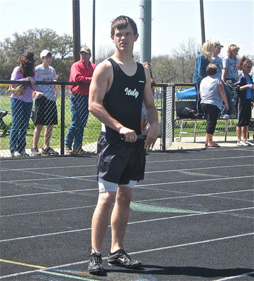 Image: Chase in the relay — Chase Hamilton gets set to run a relay.