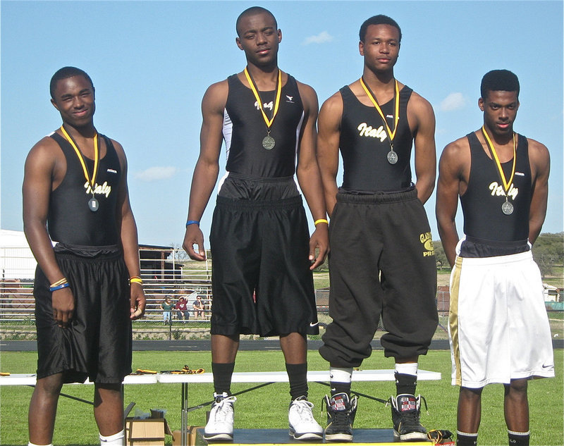 Image: A fast four — Jasenio Anderson, Desmond Anderson, De’Andre Sephus and John Isaac claim 2nd Place in the 4×100 relay.