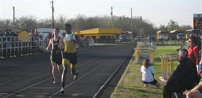 Image: Aaron Thomas — Aaron Thomas crosses the finish line.