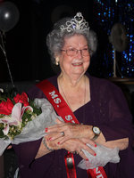 Image: Evelyn with Crown and Bouquet — Here is Evelyn all dolled up in her crown and gown.
