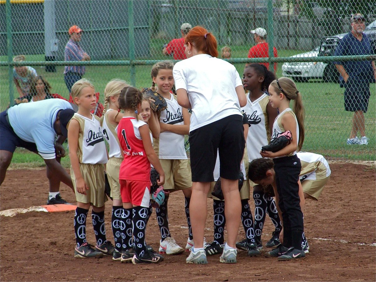 Image: Pep talk — Italy Lil’ Lady Gladiators’ head coach Lisa Mott keeps the team smiling.