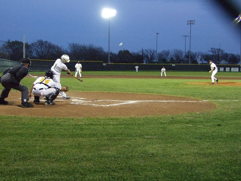 Image: Ross gives us a hit — Ross Stiles hits right up the middle.