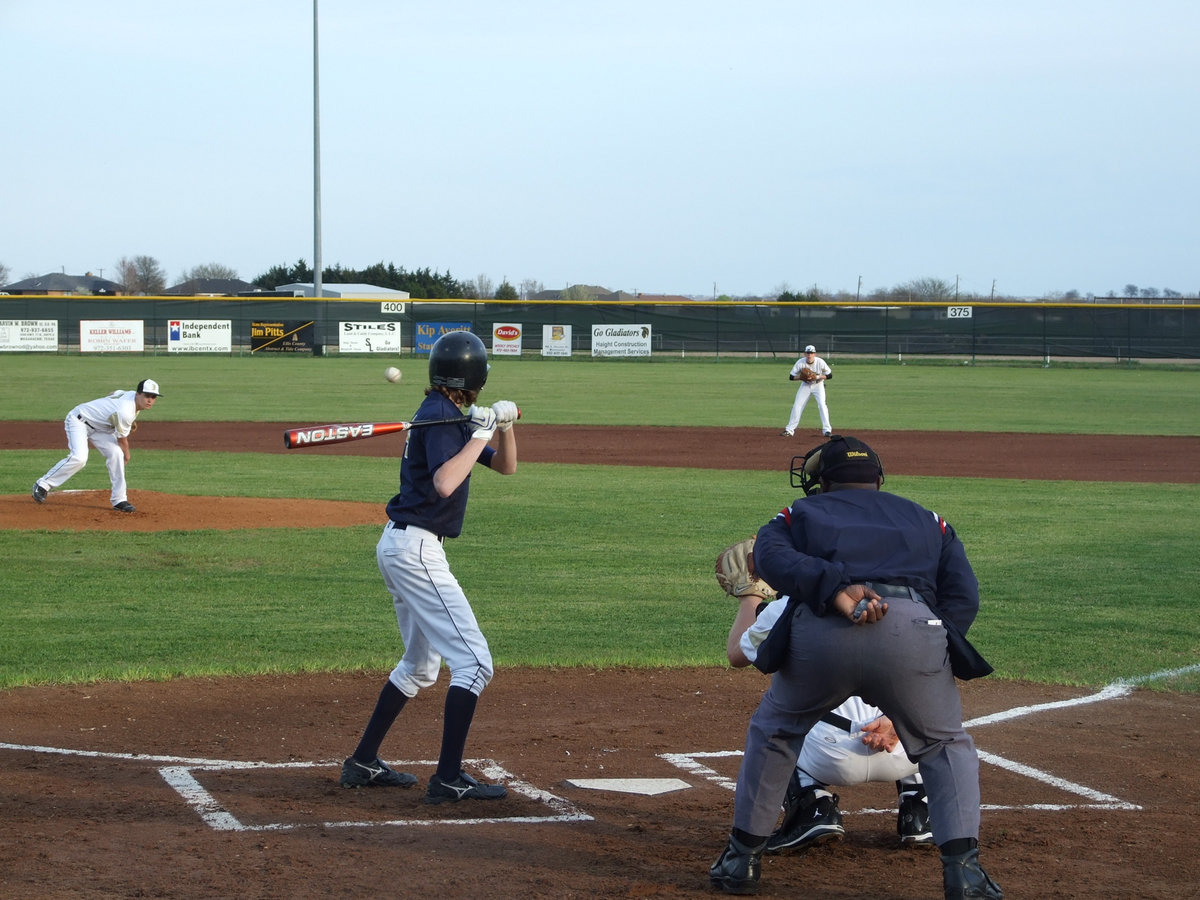 Image: Tear it up and burn it down — Trevor Patterson takes careful aim and allows no hits in this game on Monday night.  Waxahachie Advantage Academy Eagles walk home de-feathered.