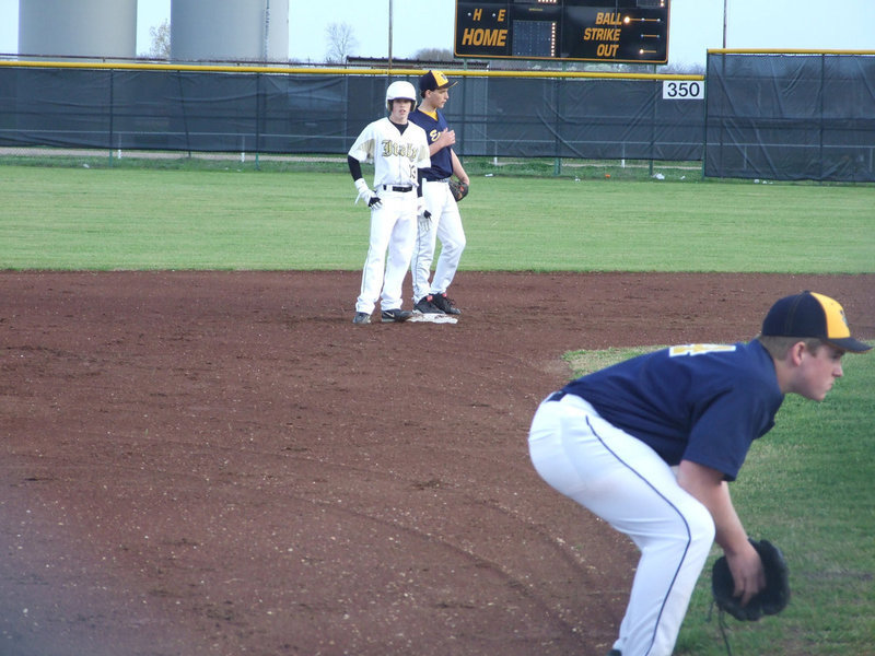 Image: Buck waits patiently — Justin Buchanan watches the coach for instructions.