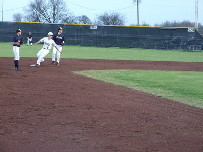 Image: Simon flies in — Ethan Simon stole some feathers from the Eagles to fly around second base.