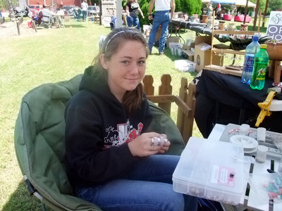 Image: Shelby McCamby — “I am here to sell my jewelry. I am fifteen years old and am from Frost. I make the jewelry and sell it so I can support my love of running barrel races and pay for my entry fees.”
