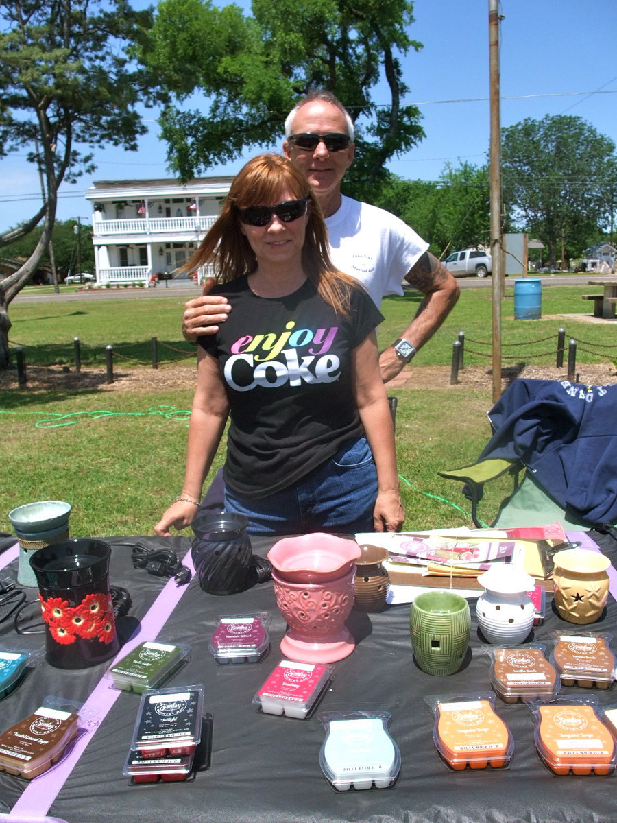 Image: Tracy Neil &amp; wife Becky — Tracy says, “We sell wickless candles and have 35 different warmers and 85 different scents here today in beautiful Milford. Remember life is too short to smell bad.”