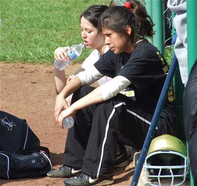 Image: Take a break — Paola Mata and Alma Suaste relax during a break from practice.