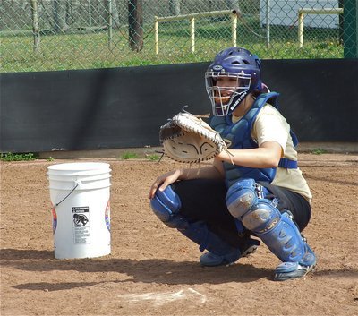 Image: Catching some heat — Catcher Alyssa Richards is entrusted with catching the fast balls from Lady Gladiator pitchers.