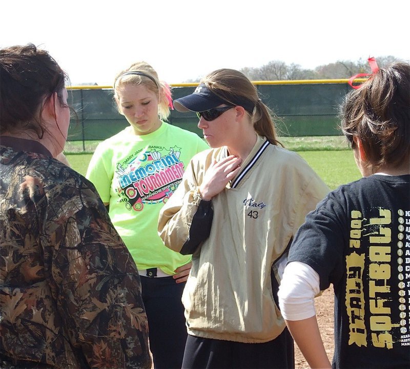 Image: Softball talk — Coach Jennifer Reeves talks to the team before ending Monday’s practice.