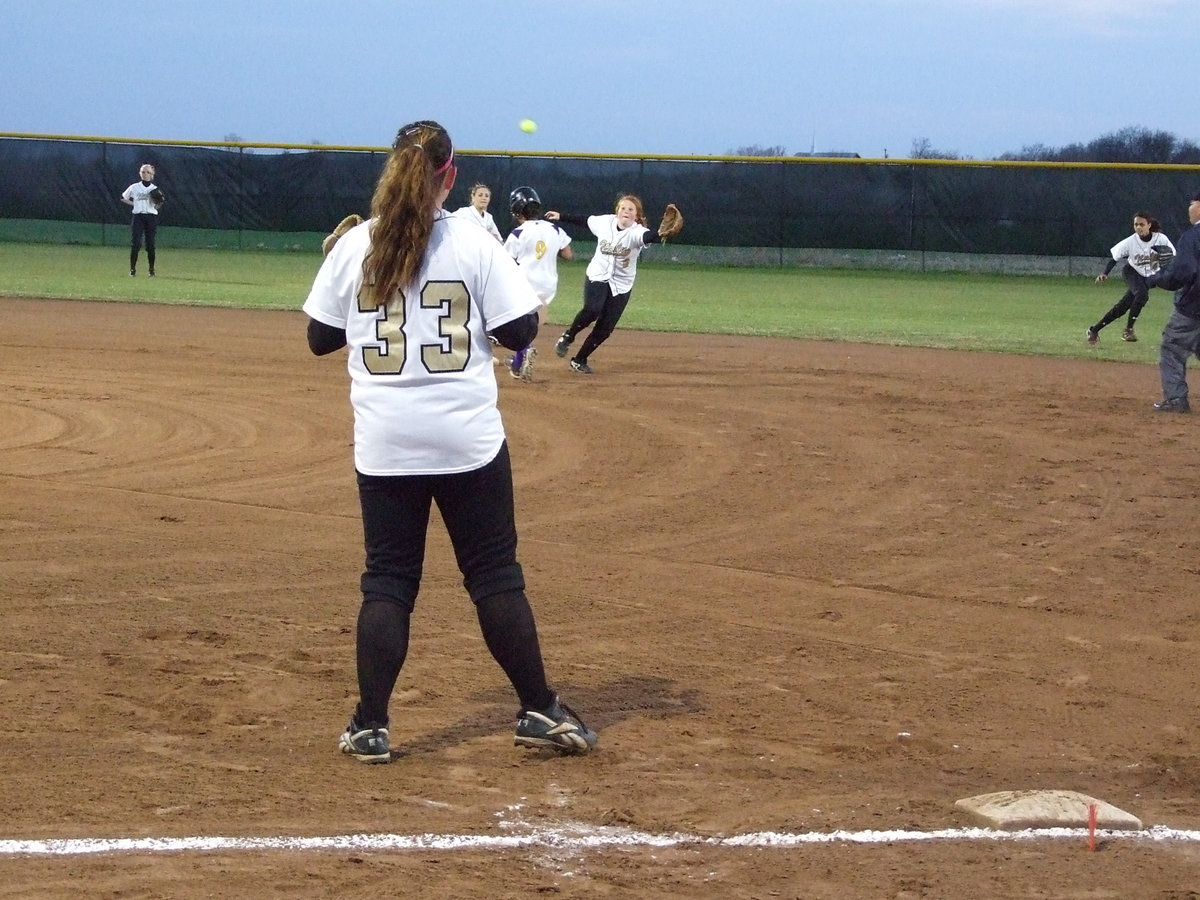 Image: Byers has it — Katie Byers stretches for the catch at 2nd base.