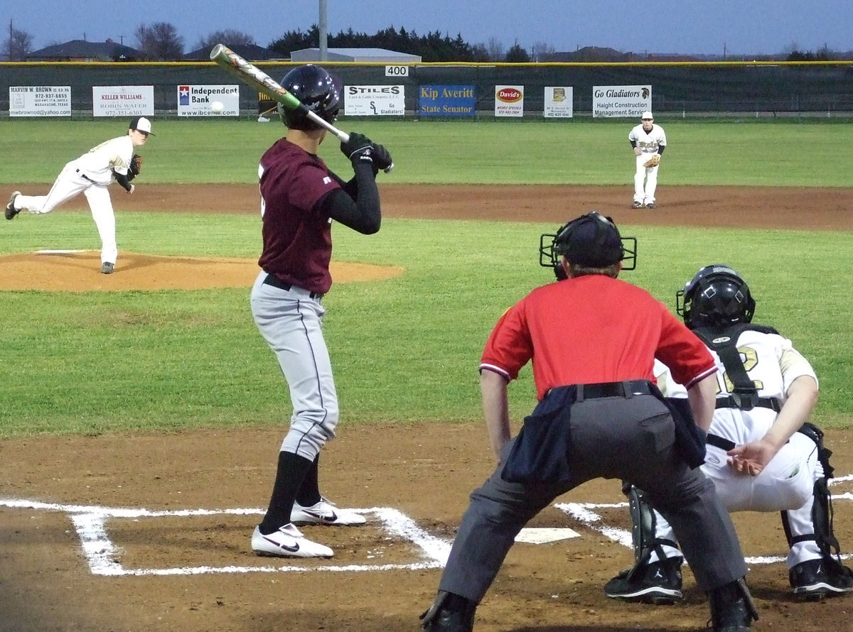 Image: Buck brings it — Eagles #5, Mani Biez, watches the ball speed to catcher Ryan Ashcraft’s mitt.