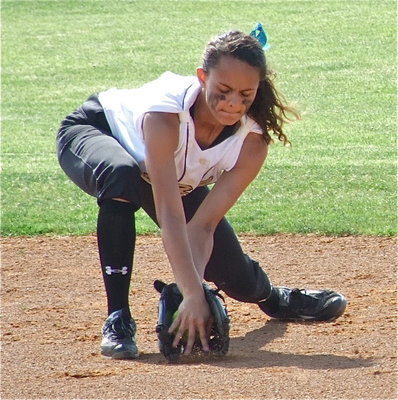 Image: Anna Viers — Anna Viers gets the job done at shortstop for the Lady Gladiators.