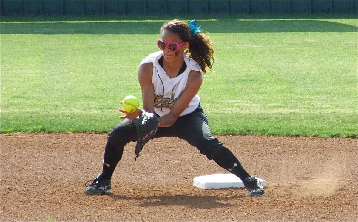 Image: Loving to play — Anna’s shades say it all.