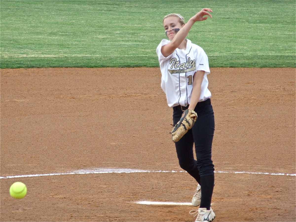 Image: Ripping the Tigers — Courtney Westbrook claws at the Blue Ridge Lady Tiger batters.