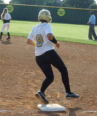 Image: Alyssa gets on — Alyssa Richards hits into the Blue Ridge outfield for a single.