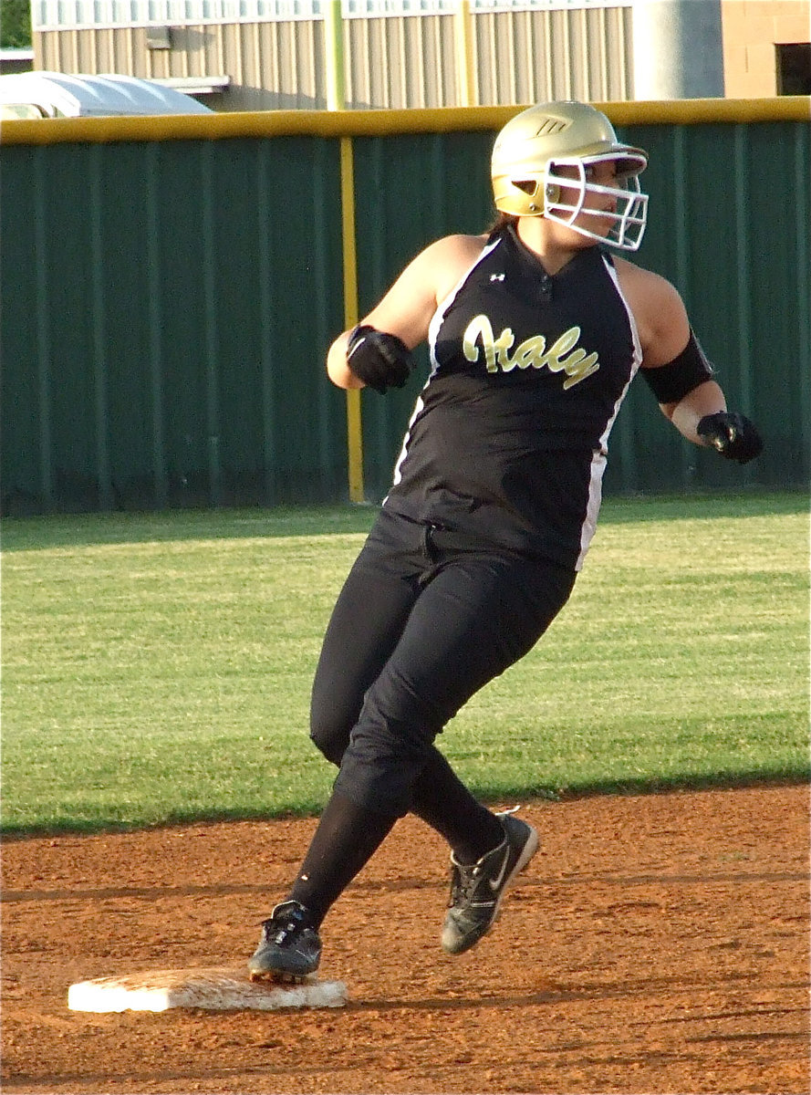 Image: Cori takes two — Cori Jeffords makes it to second base in game two.