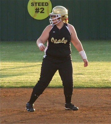 Image: Between bases — Meredith Brummett looks for an opportunity to advance to third base in game two.