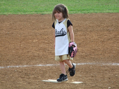 Image: Cutie on the mound — Morgan Chambers is ready to chase down grounders