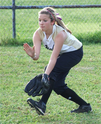 Image: Morgan fields the ball — Morgan Cockerham charges a grounder during warm-ups.