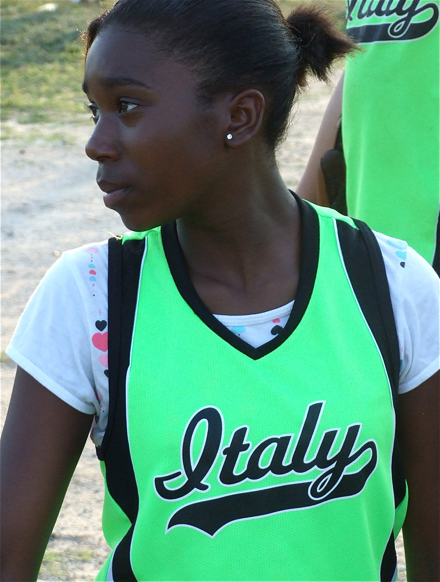 Image: Janae’s ready — Italy’s 6th grader Janae Robertson gets ready to take the field against Whitney.