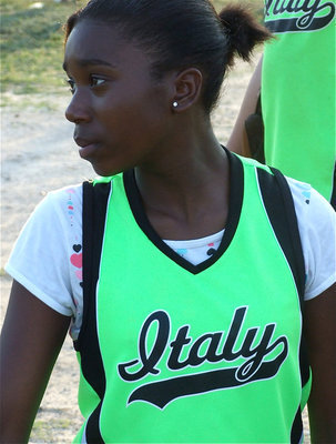 Image: Janae’s ready — Italy’s 6th grader Janae Robertson gets ready to take the field against Whitney.