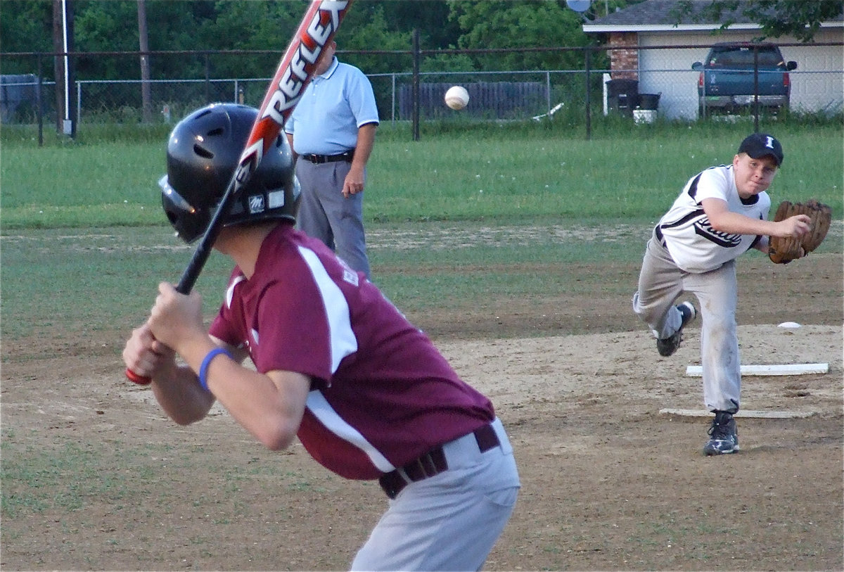 Image: Bring it home — Italy’s John Escamilla brings home the win for his 12u boys team.