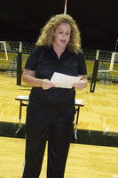 Image: Head Coach Stacy McDonald — Coach McDonald reads the Commitment Contract to parents Thursday night.