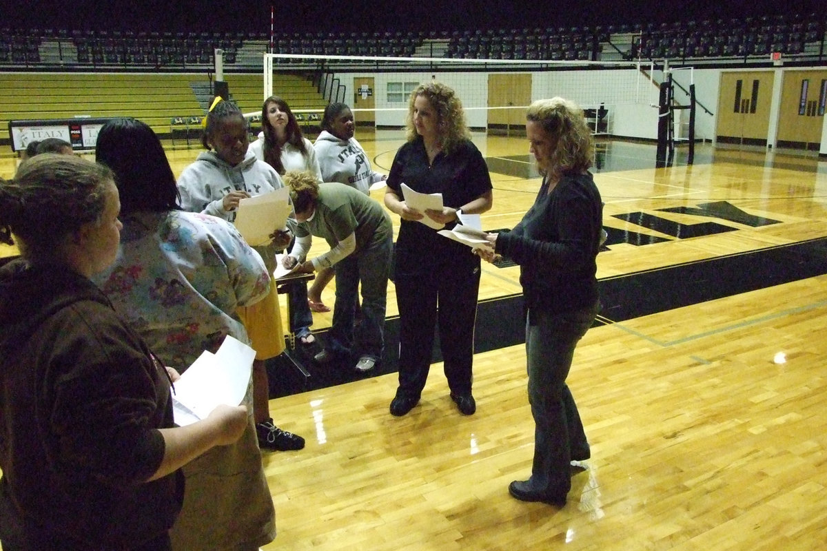 Image: McDonald and parents meet — Coach Stacy McDonald meets basketball parents at Thursday night’s meeting.