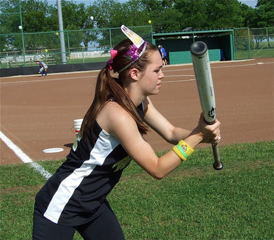 Image: Crowning moment — Drew Windham works on her bunting while wearing her Senior 2010 crown.