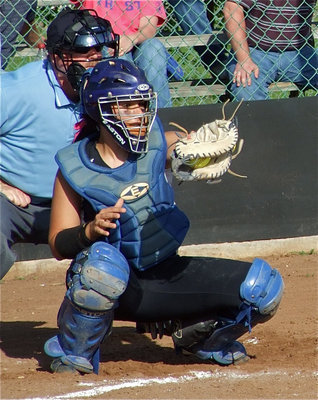 Image: On the mark — Lady Gladiator catcher Alyssa Richards catches a strike from her senior pitcher, Courtney Westbrook.