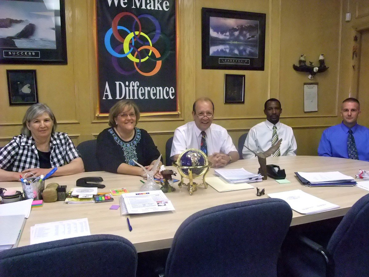 Image: The Team — This team figures out strategies on how best to help the students succeed.