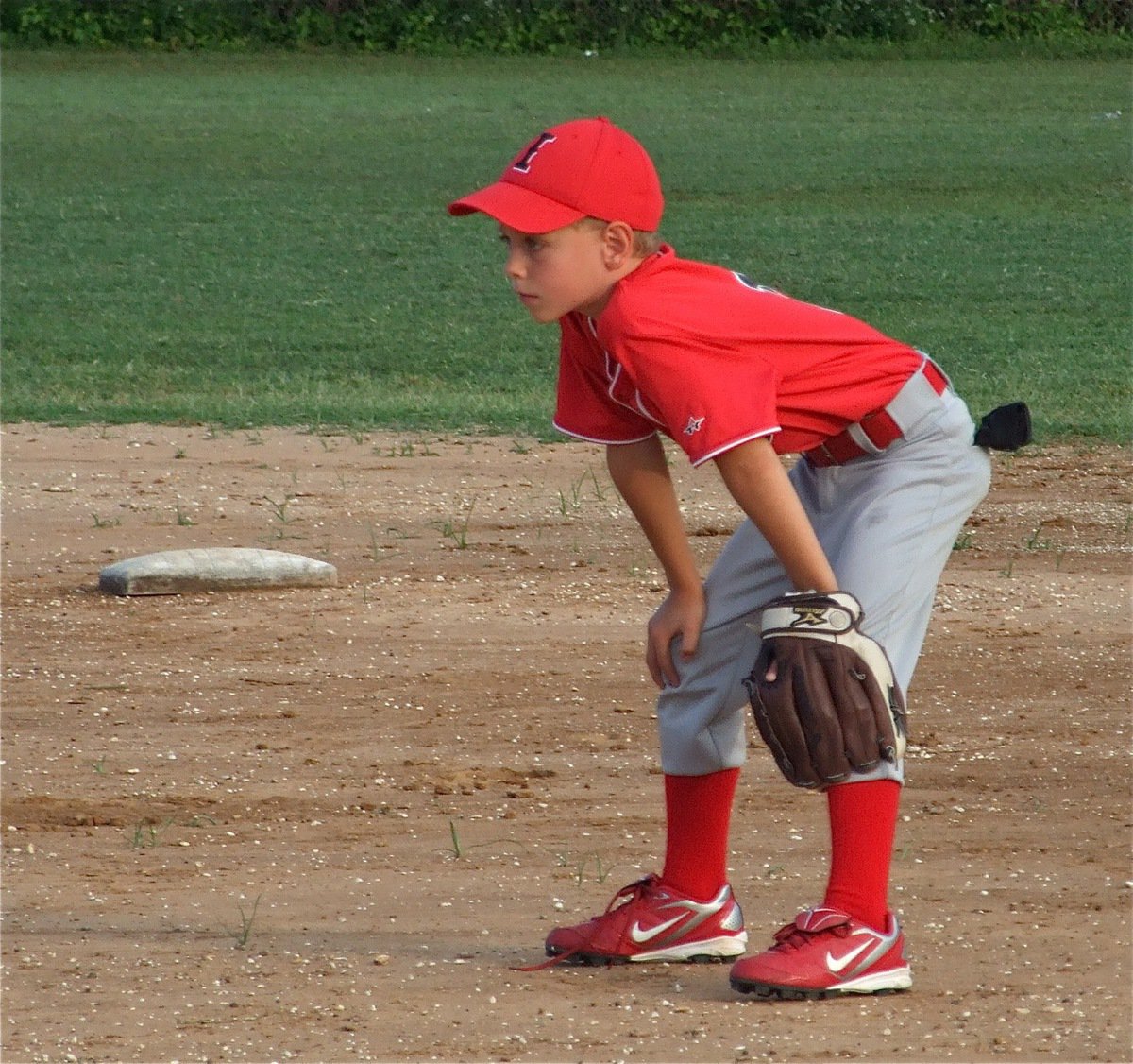 Image: Creighton’s at second — Creighton Hyles holds his ground at second base for the IYAA boy’s machine pitch team.