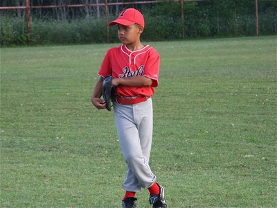 Image: Cornelius is comfortable — Cornelius Jones is cute as can be in right field for the IYAA boy’s machine pitch team.