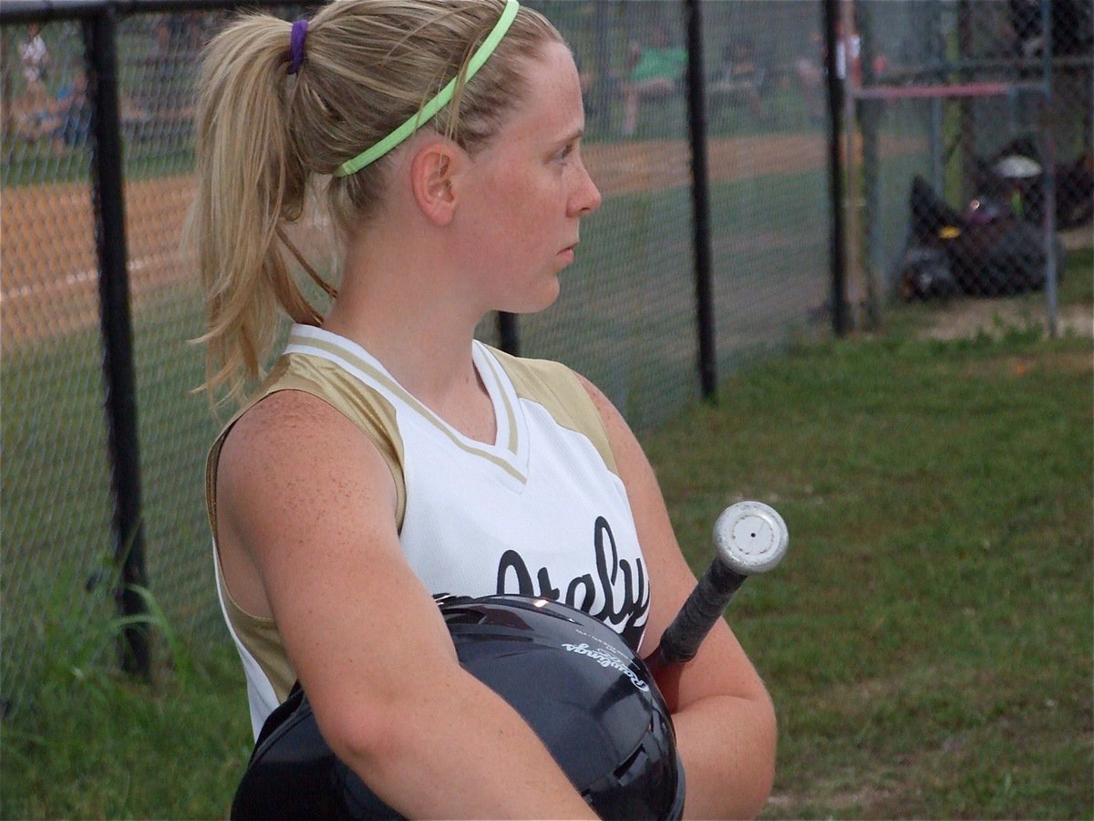 Image: Bledsue’s next — Heather Bledsue gets set to hit in the batting cage.