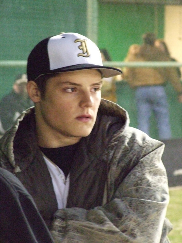 Image: Simon reflects — Ethan Simon gets his game face on before the Jaguars take the field.