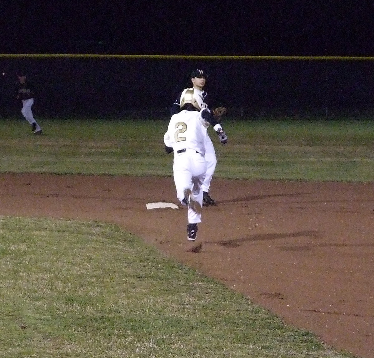 Image: Caden puts on the steam — Freshman Caden Jacinto wows the audience with pitching and scoring.