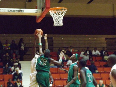 Image: Trying To Stop Anderson — Kerens had it’s hands full trying to stop Italy’s #11 Jasenio Anderson.