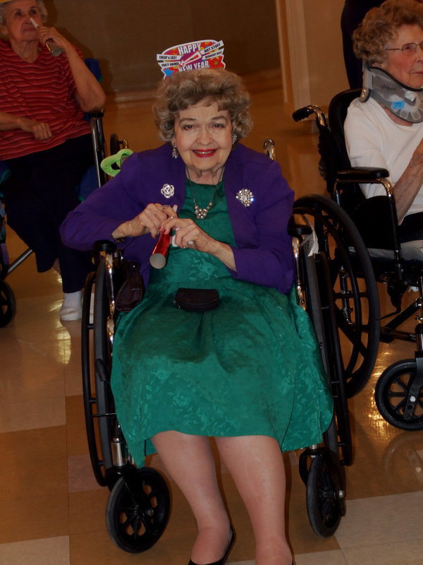 Image: Let’s Party! — Lillian Martin is ready to have a great time with her party hat and horn.